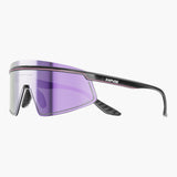 Sunglasses with purple lens and black frame on a white background, featuring the UNBOUND brand.