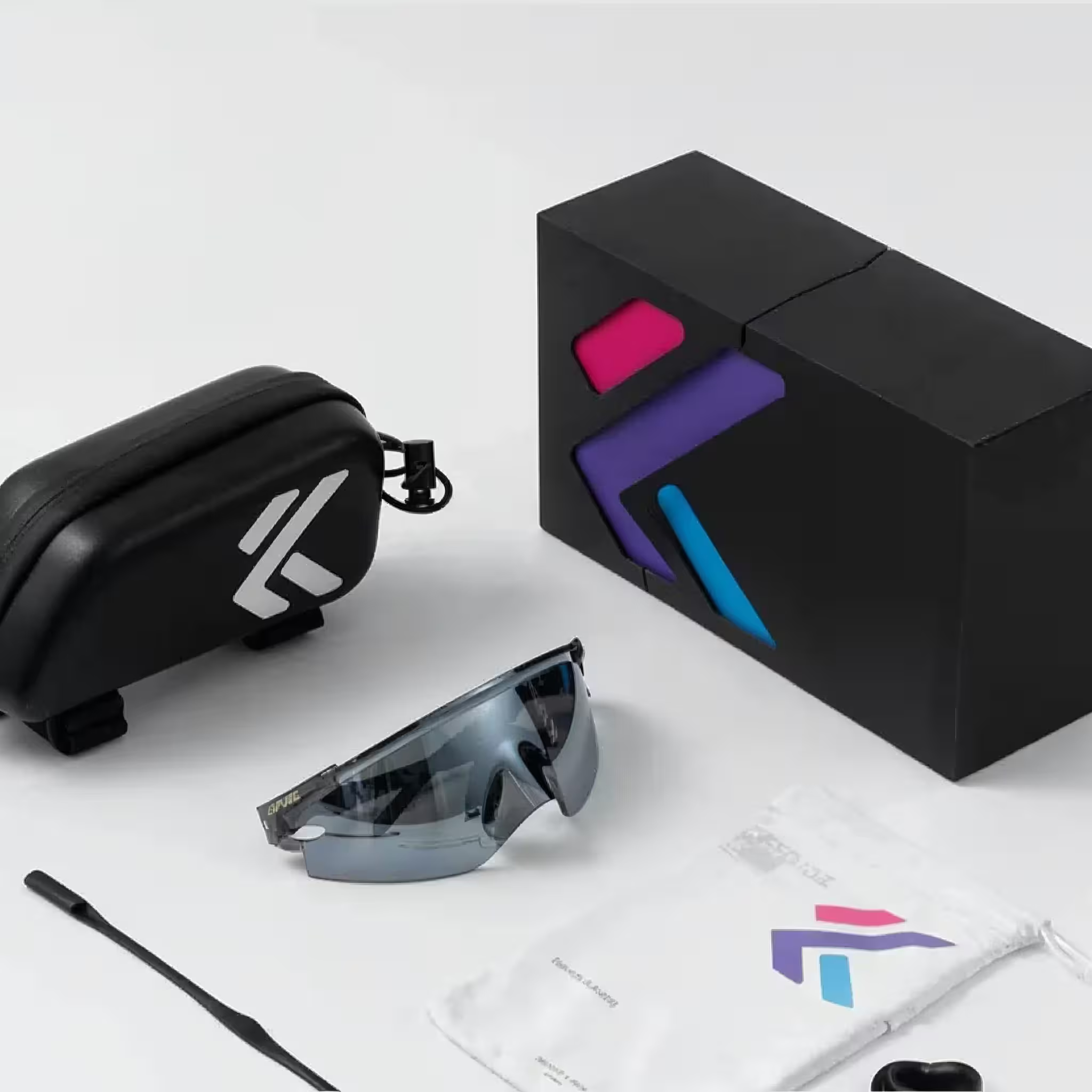 Sunglasses with case and packaging on a white background