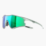 Sunglasses with green reflective lenses and silver frame on a white background, featuring the UNBOUND brand.