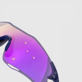 Close-up of a pair of sunglasses with a gradient purple and blue lens on a light gray background