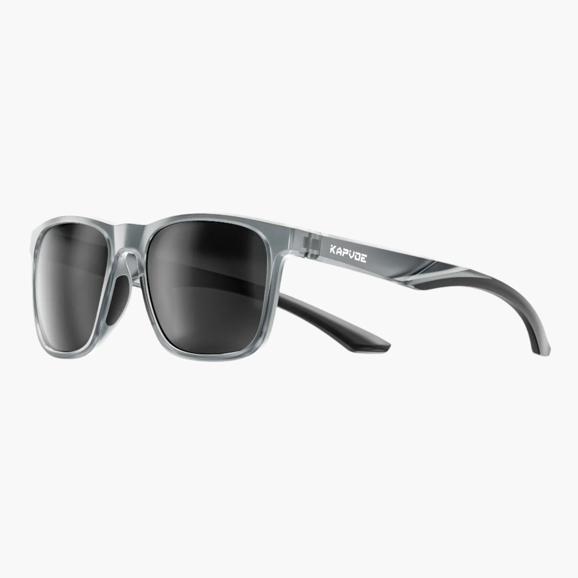 Sunglasses with gray frame and dark lenses on a white background, featuring the UNBOUND brand.