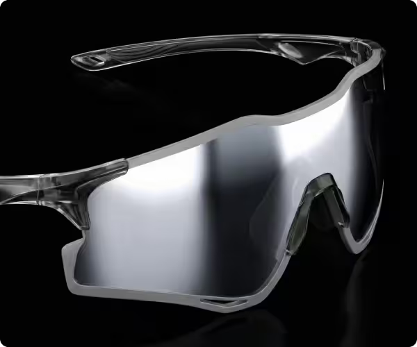 Clear protective goggles on a black background