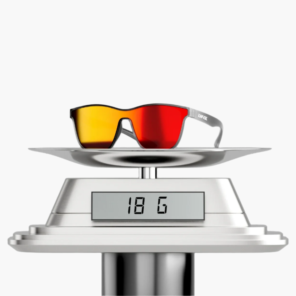 Digital scale with a pair of sunglasses on top displaying a weight reading.