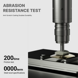 Abrasion resistance test with a drill bit and steel wool on a white background