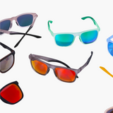 Collection of colorful sunglasses on a white background